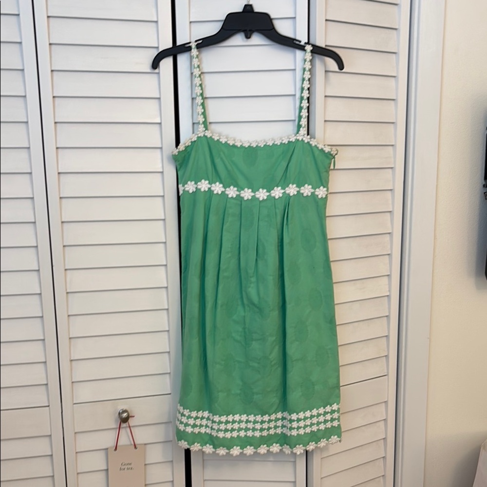 Juicy Couture empire waist dress. Light green with white lace trim. Size 4. EUC